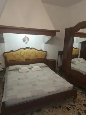 Letto o letti in una camera di My Rialto Palace