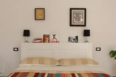 Letto o letti in una camera di Casa Clarita - in centro storico