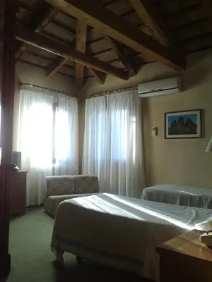 Letto o letti in una camera di Locanda Stella D'oro
