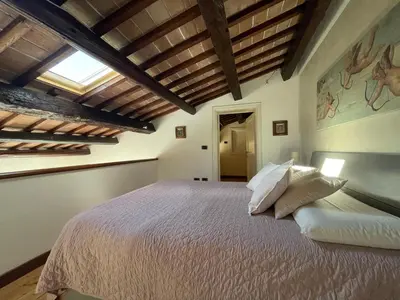 Letto o letti in una camera di Elena Casa Turistica