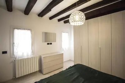 Letto o letti in una camera di Dimora Marchiada - Isola di Pellestrina Ve