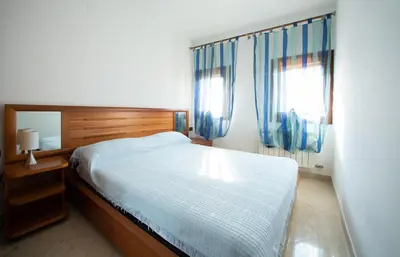 Letto o letti in una camera di Dimora Laguna - Isola di Pellestrina Ve