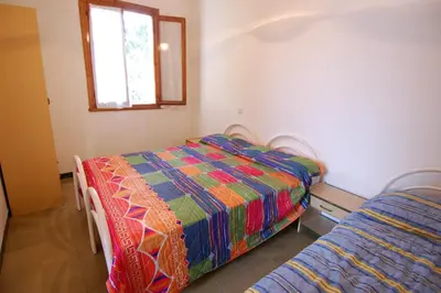 Letto o letti in una camera di Villa Lory