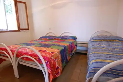 Letto o letti in una camera di Villa Lory