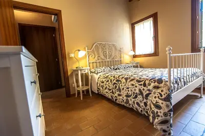 Letto o letti in una camera di Particolari del Brenta