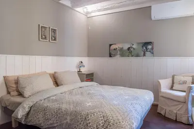 Letto o letti in una camera di Ca Falier Piccolo - little sweet studio in 10-12 minutes from bus&train station
