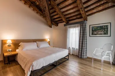 Letto o letti in una camera di Hotel Ristorante Magia del Brenta