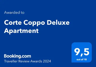 Certificato, attestato, insegna o altro documento esposto da Corte Coppo Deluxe Apartment
