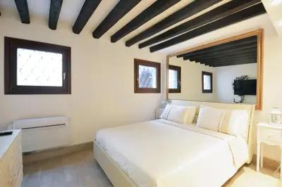 Letto o letti in una camera di Casanova Flat