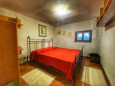 Letto o letti in una camera di Villa Stefania Asolo piscina e biliardo