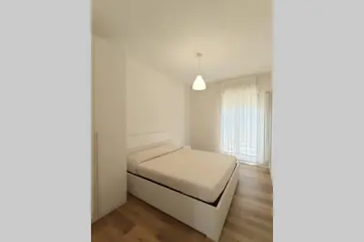 Letto o letti in una camera di DELTA D Piazza Marina- 50 MT dal mare - Immobil Relax