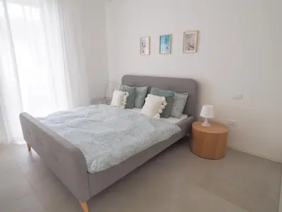 Letto o letti in una camera di Apartment Luma with Pool