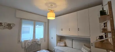 Letto o letti in una camera di Ca' Olivo