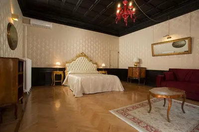 Letto o letti in una camera di palazzo suite ducale