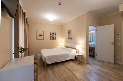 Letto o letti in una camera di Locanda GIOVI CA' DI PONTE