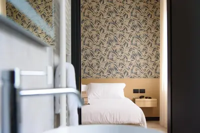 Letto o letti in una camera di Hotel Zenit