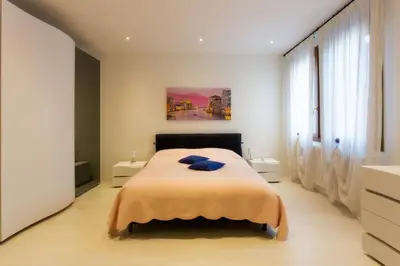 Letto o letti in una camera di Guglie