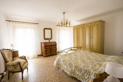Letto o letti in una camera di Le Sorelle