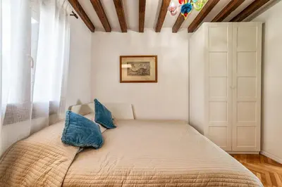 Letto o letti in una camera di Casanova Fenice - Canal View