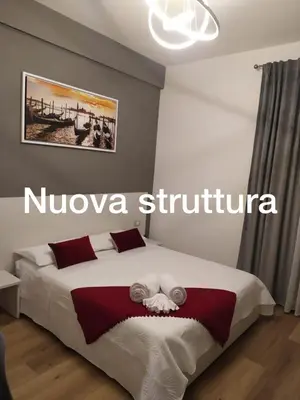 Letto o letti in una camera di Venice Rooms