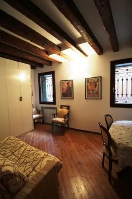 Letto o letti in una camera di Venezianamente Apartments - Venice City Centre