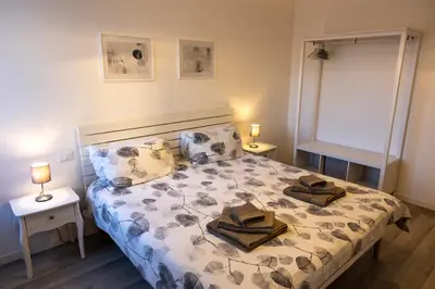 Letto o letti in una camera di ANGELA GUEST HOUSE in centro storico