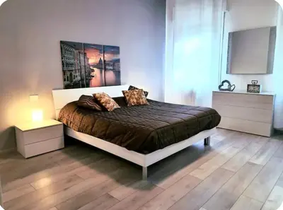Letto o letti in una camera di Marco's apartment -ideale per Venezia-