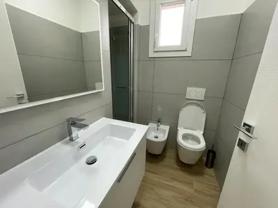 Bagno di CONDOMINIO ROSA- WALTERIGATO APARTMENTS-SOLO PER FAMIGLIE