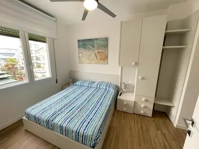 Letto o letti in una camera di CONDOMINIO ROSA- WALTERIGATO APARTMENTS-SOLO PER FAMIGLIE
