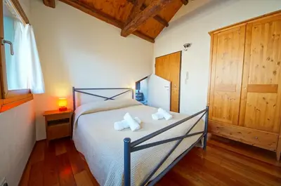 Letto o letti in una camera di Ca Ponte dei Greci S163