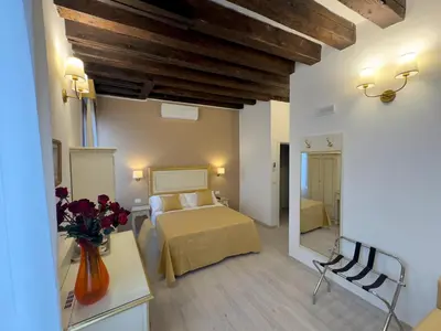 Letto o letti in una camera di Residenza Briati