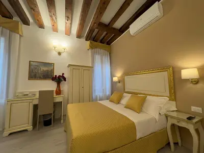 Letto o letti in una camera di Residenza Briati