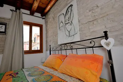 Letto o letti in una camera di Casa dea corte apartment