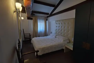 Letto o letti in una camera di Palazzo Eugenia - Minelli
