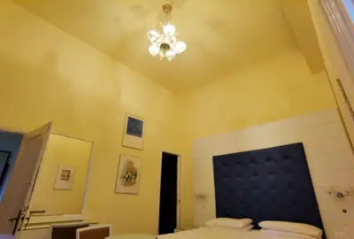 Letto o letti in una camera di Palazzo Eugenia - Minelli