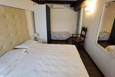 Letto o letti in una camera di Palazzo Eugenia - Minelli