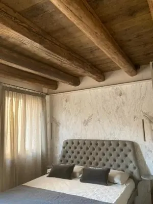 Letto o letti in una camera di Palazzetto Dieda