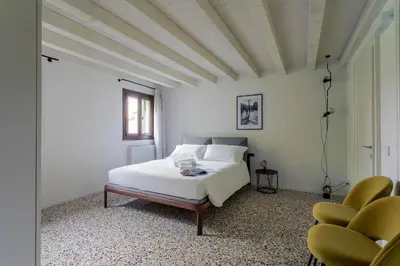 Letto o letti in una camera di Palazzo Venere Apartments
