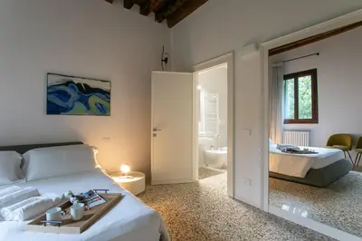Letto o letti in una camera di Palazzo Venere Apartments