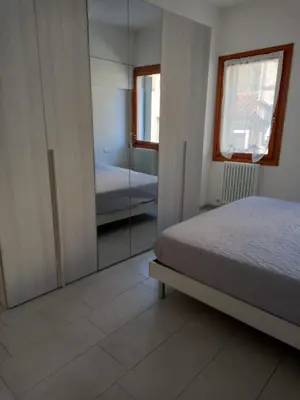 Letto o letti in una camera di Casa Alice