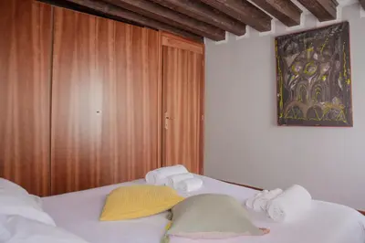 Letto o letti in una camera di Appartamenti Superior in Via Garibaldi by Bricola Apartments