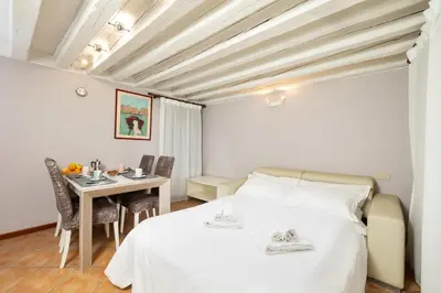 Letto o letti in una camera di Appartamenti Superior in Via Garibaldi by Bricola Apartments