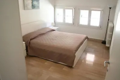 Letto o letti in una camera di Casa Palladio S