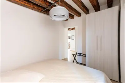 Letto o letti in una camera di Palazzina San Polo 2151
