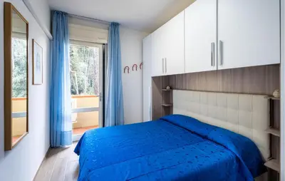 Letto o letti in una camera di Perla