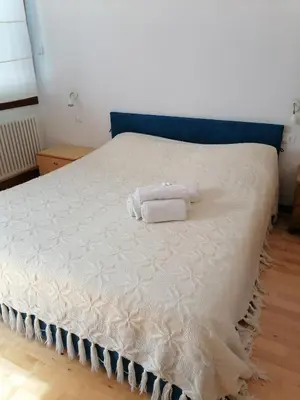 Letto o letti in una camera di Casa pergoletto