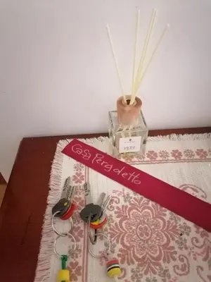 Letto o letti in una camera di Casa pergoletto