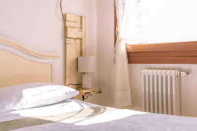 Letto o letti in una camera di Venice's neighbor Home