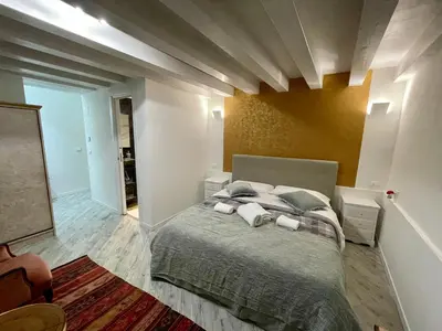 Letto o letti in una camera di Hayez Rooms