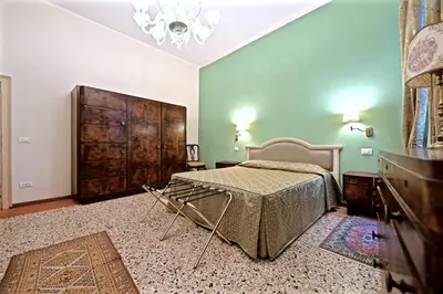 Letto o letti in una camera di Chandeliers Apartment